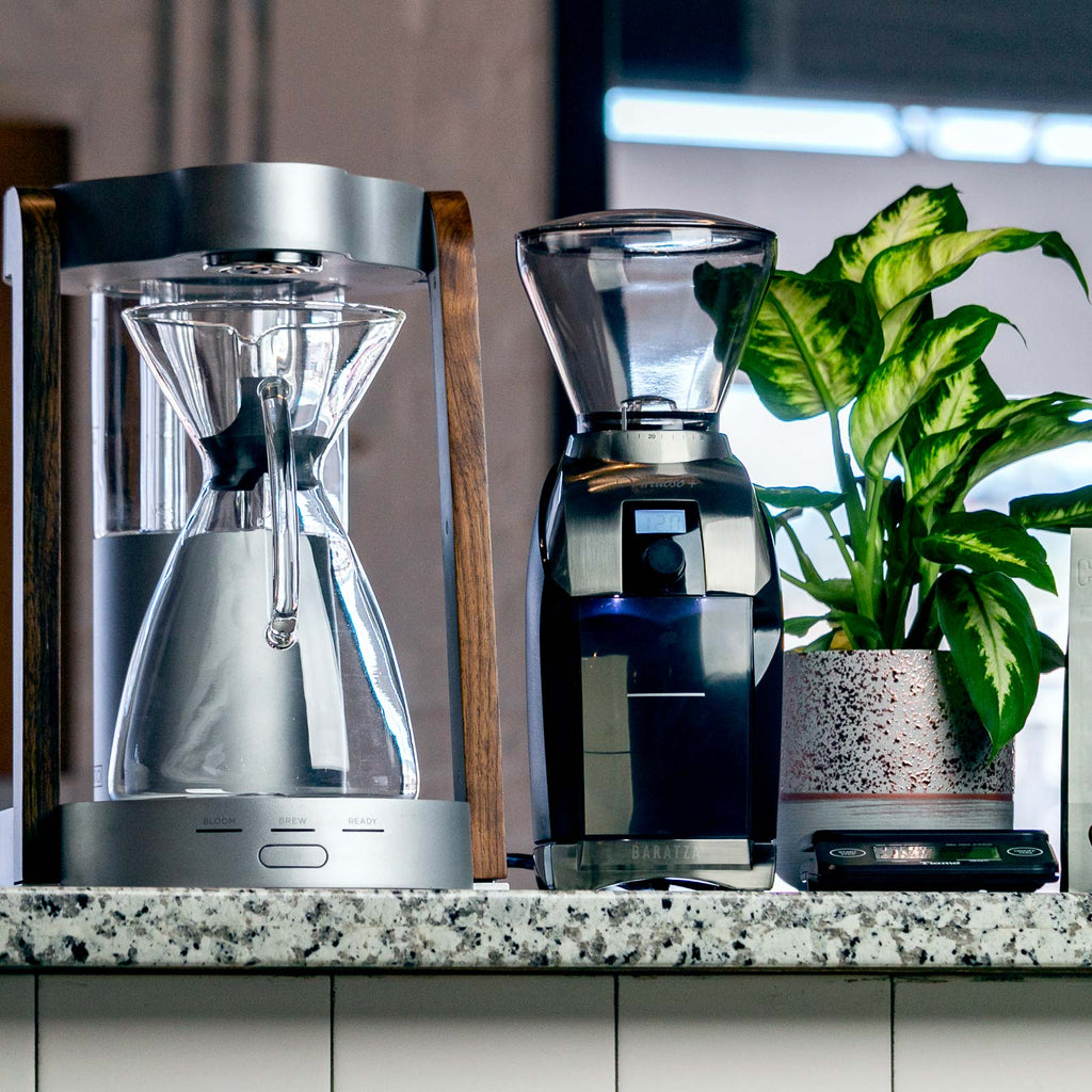 http://clivecoffee.com/cdn/shop/articles/Baratza-Virtuoso-Plus-Conical-Coffee-Grinder-01.jpg?crop=center&height=1024&v=1696276134&width=1024