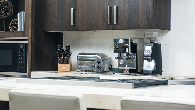 ECM Casa V Espresso Machine next to Eureka Atom espresso grinder, Clive Coffee - Lifestyle - large