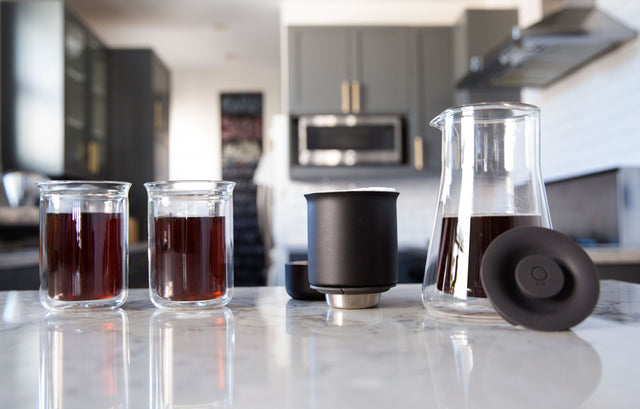 Fellow Stagg [XF] Pour Over Set next to tasting glasses, Clive Coffee - Lifestyle