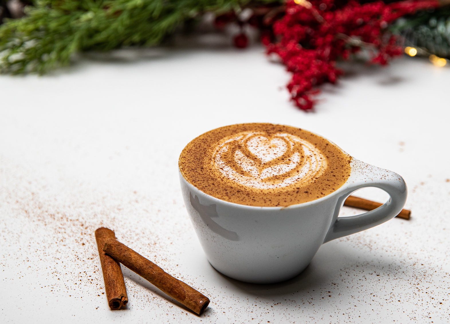 https://clivecoffee.com/cdn/shop/articles/Holiday-cocktails-eggnog-latte.jpg?v=1639167034&width=1571