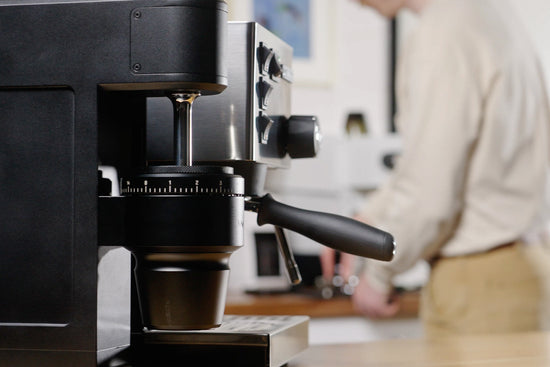 Side view of the Weber Key espresso grinder in black lifestyle by clive coffee