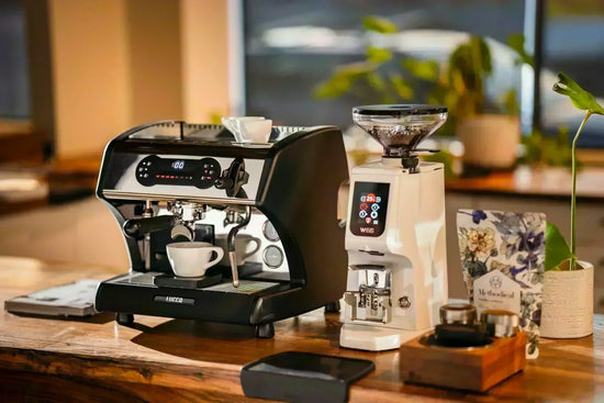 LUCCA A53 Pro Espresso Machine next to the Eureka Atom W 65 Espresso Grinder Lifestyle by Clive Coffee