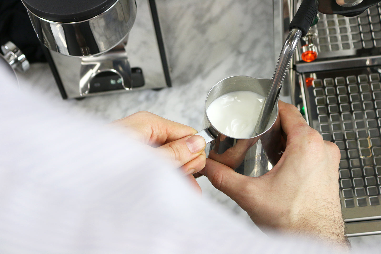 The Science Behind Perfect Steamed Milk, blog from Clive Coffee, steaming milk on an espresso machine