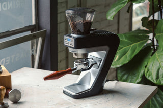 Baratza Sette 270 coffee grinder with clear bean hopper on a kitchen counter