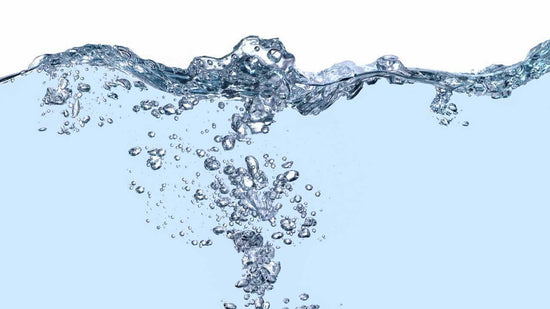 Splashing water with bubbles illustrating espresso water composition