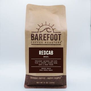 Barefoot Coffee Roasters Redcab bag with logo on brown kraft packaging and Redcab Brazil label