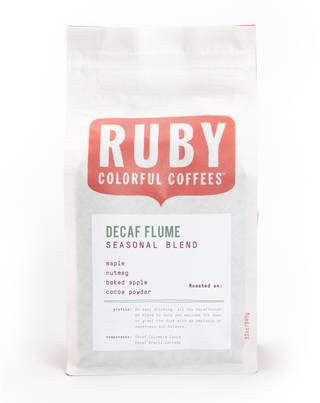 Decaf Flume Seasonal Blend bag by Ruby Coffee Roasters with a bold red RUBY logo and label.