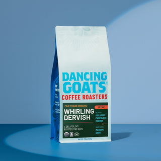 Decaf Organic Whirling Dervish coffee bag with bold label on blue surface