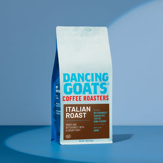 Italian Roast coffee bag with a brown tasting notes panel on a white package against a blue surface