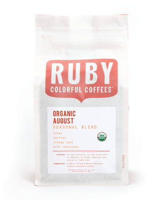 Ruby Colorful Coffees bag displaying the large red RUBY logo and Organic August Seasonal Blend label