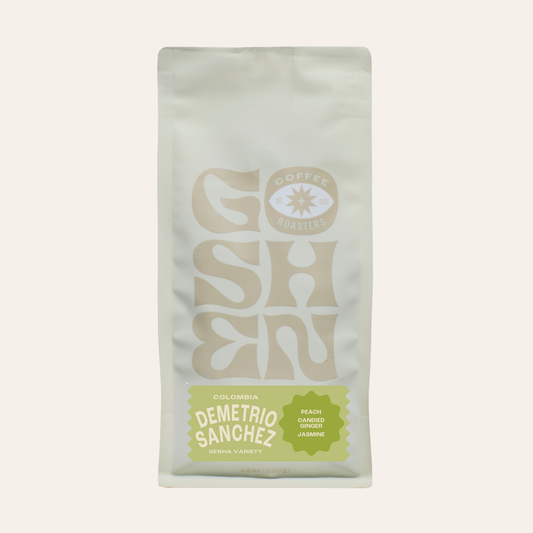 Top of a white Colombia Demetrio Sanchez Gesha coffee bag with subtle branding