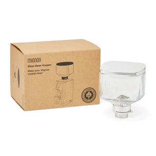 Eureka Mignon Glass Bean Hopper shown beside its cardboard packaging box.