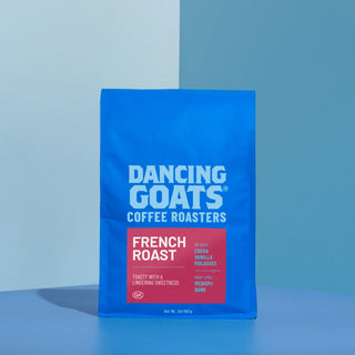 Blue Dancing Goats coffee bag with large white logo text.