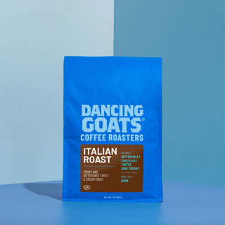 Dancing Goats blue coffee bag with large white DANCING GOATS logo across the front