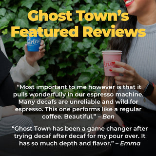 Outdoor shot of two people holding coffee cups with Ghost Town's Featured Reviews headline overlay.