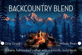 Backcountry Blend coffee packaging featuring a campfire beneath a starry mountain range.