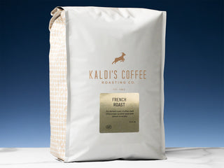 White Kaldi's Coffee bag with beige side pattern and gold French Roast label.