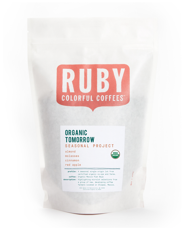 White coffee bag with a large red Ruby logo and Organic Tomorrow Seasonal Project label