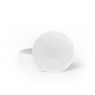 Stack of white AeroPress paper filters
