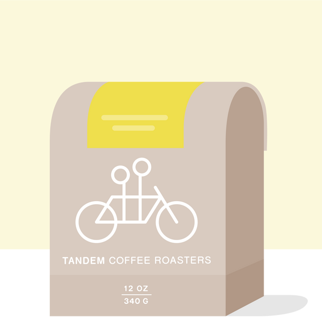 Abstract illustration of a beige coffee bag against a bright yellow background with Tandem Coffee Roasters branding.