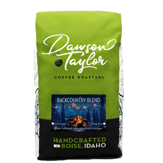 Green Dawson Taylor Backcountry Blend coffee bag with mountain label and Boise Idaho branding