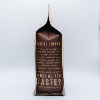 The Boss Espresso Blend bag from Barefoot Coffee Roasters with a dark brown label reading GREAT COFFEE
