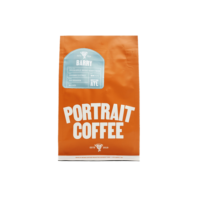 Bright orange Portrait Coffee bag labeled BARRY with a light blue tasting notes sticker