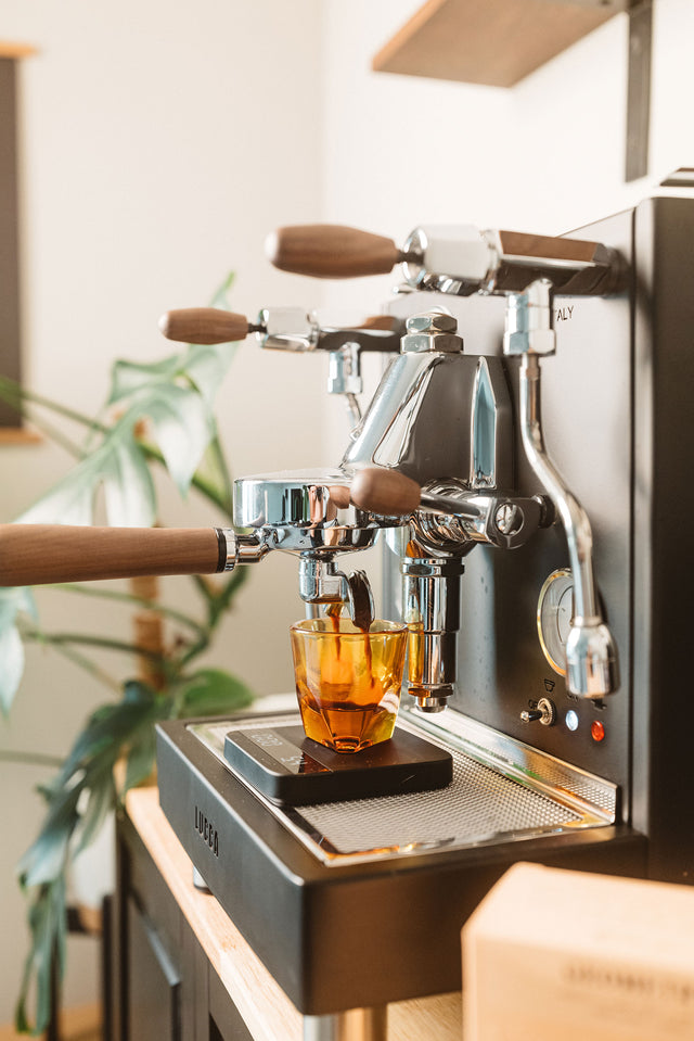 LUCCA M58 Espresso Machine and Acaia Lunar Espresso Scale, and NotNeutral Vero Glass, from Clive Coffee, lifestyle