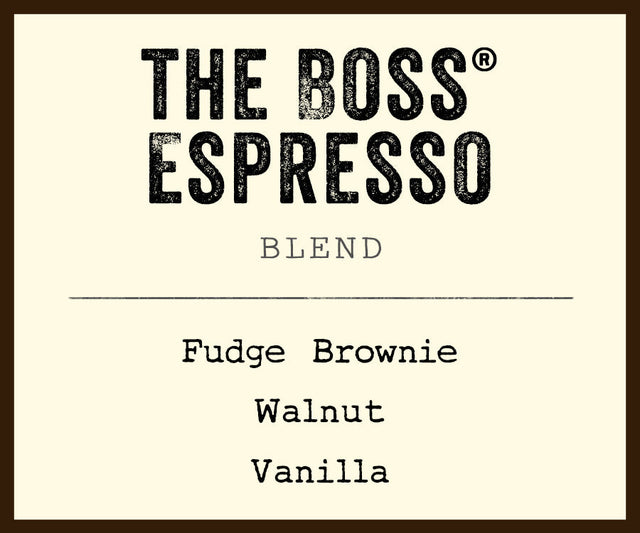 The Boss Espresso Blend label on a beige bag listing Fudge Brownie Walnut Vanilla flavors