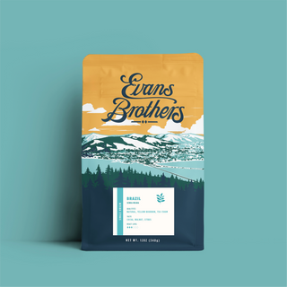 Serra Negra Natural Brazilian coffee bag with mountain artwork on a yellow package