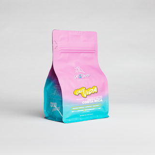 Pink Costa Rica Cafe Vida coffee bag against a light gray background