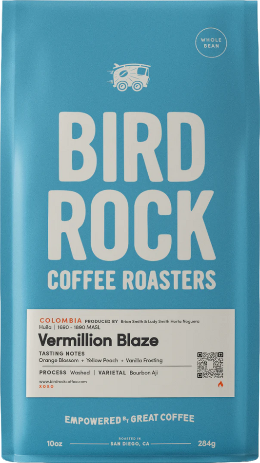 Blue Bird Rock Coffee Roasters Vermillion Blaze bag with tasting notes orange blossom yellow peach and vanilla frosting