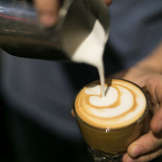 pouring latte art clive coffee lifestyle