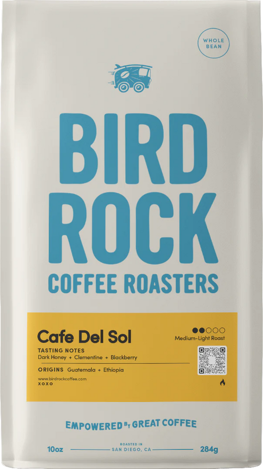 Cafe Del Sol coffee bag by Bird Rock Coffee Roasters with bold blue logo and yellow tasting notes panel