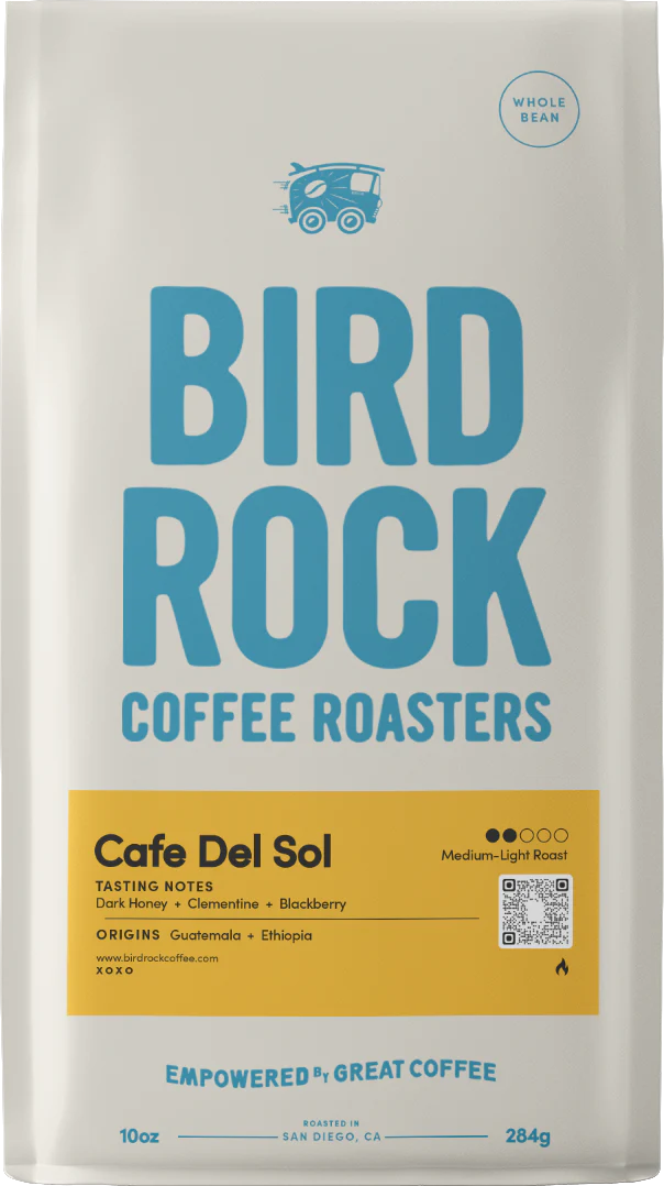 Cafe Del Sol coffee bag by Bird Rock Coffee Roasters with bold blue logo and yellow tasting notes panel