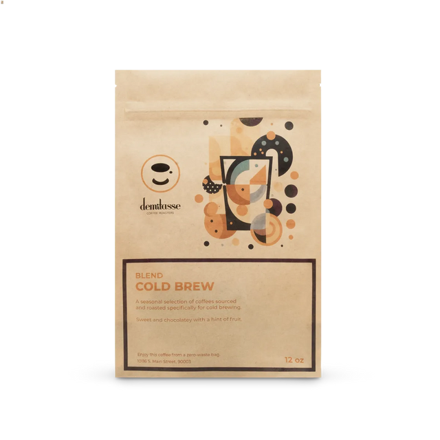 Cold Brew Blend coffee bag with large orange COLD BREW text and circular geometric illustration