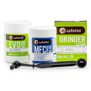 Espresso cleaning kit with three Cafetto cleaners and a cleaning brush.