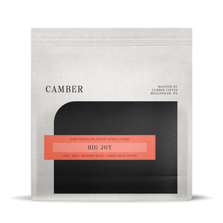 Camber Coffee Big Joy Espresso bag with a coral label across a black rounded panel