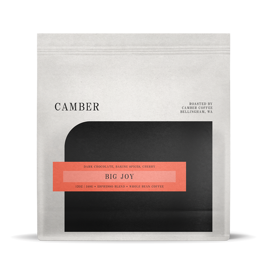 Camber Coffee Big Joy Espresso bag with a coral label across a black rounded panel