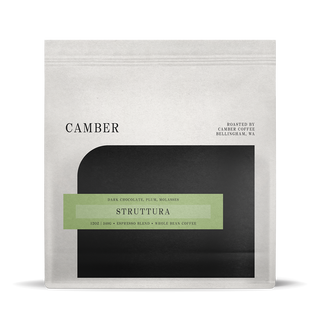 Camber Coffee Struttura espresso blend bag with pale green label on a light bag over a black rounded inset.