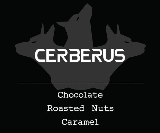 Cerberus coffee label with three dog silhouettes on a black background and chocolate roasted nuts caramel text