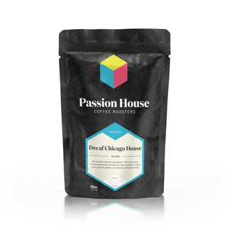 Black Passion House Coffee Roasters bag with colorful cube logo and teal hex badge reading Decaf Chicago House Blend
