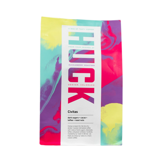 Civitas coffee bag with bright multicolor abstract design and a white label on the front