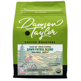 Green Dawn Patrol Blend organic coffee bag by Dawson Taylor with mountain illustration and Peruvian and Sumatran beans.