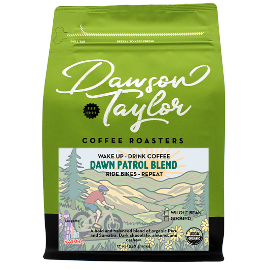 Green Dawn Patrol Blend organic coffee bag by Dawson Taylor with mountain illustration and Peruvian and Sumatran beans.