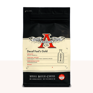 Decaf Fool's Gold coffee bag by Anodyne with cream label and red logo on black packaging