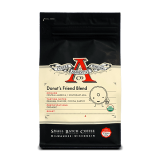 Donut's Friend Blend organic coffee bag from Anodyne with black top, cream label, and USDA Organic badge