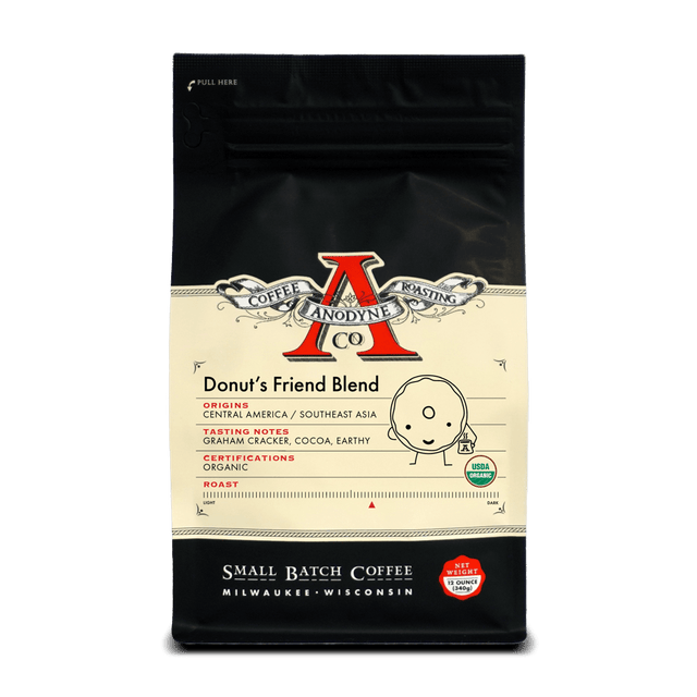 Donut's Friend Blend organic coffee bag from Anodyne with black top, cream label, and USDA Organic badge