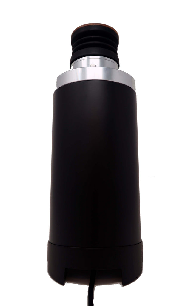 Close-up of the grinder head showing a black flexible hopper and silver neck.