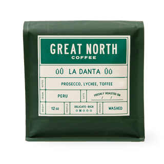 Close-up of a dark green La Danta coffee bag with Great North Coffee branding and origin notes